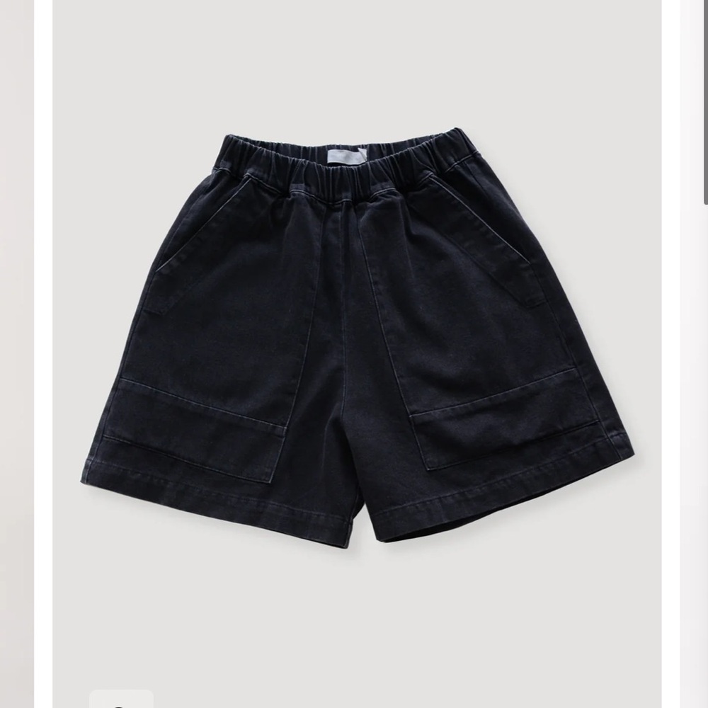 Micaela Greg faded black field short
